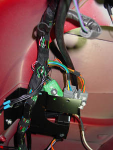 securely plug these connectors into the mating connectors inside the vehicle and snap into the mounting bracket